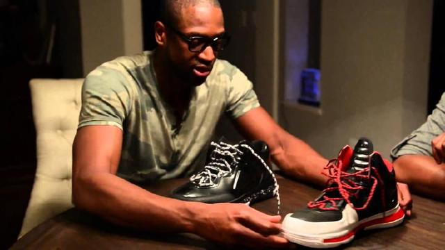 安娜-德-阿玛斯现身F1阿布扎比站挥旗（安娜·德·阿玛斯亮相F1阿布扎比大奖赛挥动方格旗）